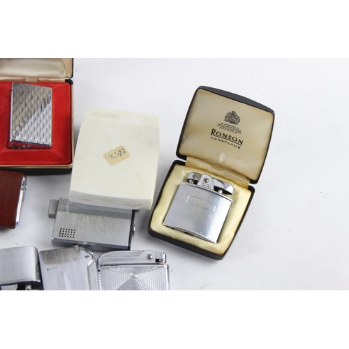 1122 - A large collection of vintage cigarette lighters to include Ronson etc.