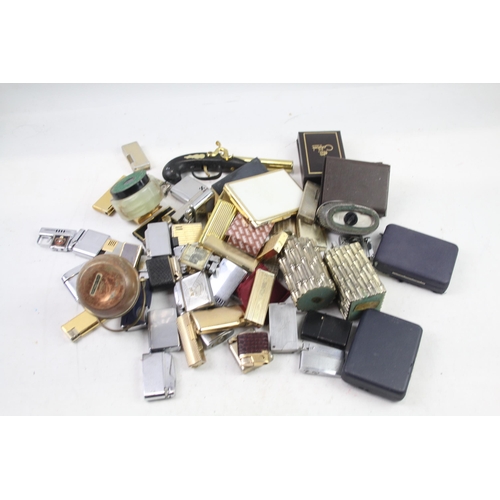 1123 - A large collection of vintage lighters to include Colibri etc.