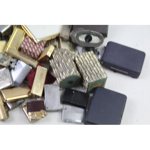 1123 - A large collection of vintage lighters to include Colibri etc.