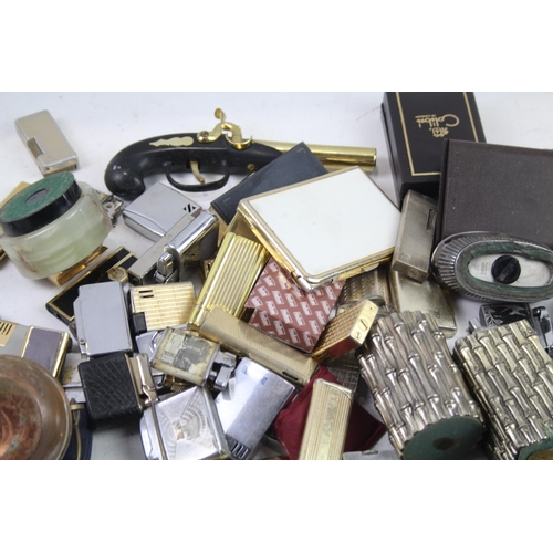 1123 - A large collection of vintage lighters to include Colibri etc.