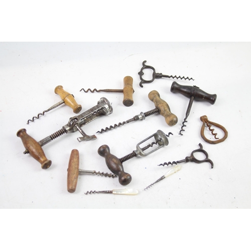 1124 - Twelve antique and later corkscrews