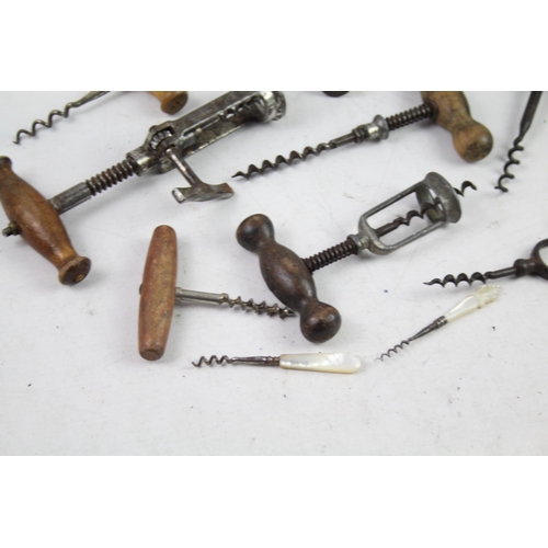 1124 - Twelve antique and later corkscrews