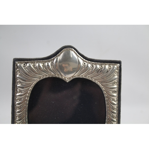 2454 - Two .925 sterling silver photograph frames - largest approx. 13.5cm wide x 19cm high