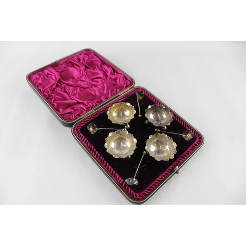 2455 - A cased set of four .925 sterling silver salt dishes with spoons - approx. gross weight 60g