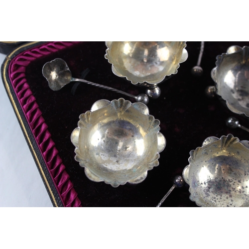 2455 - A cased set of four .925 sterling silver salt dishes with spoons - approx. gross weight 60g