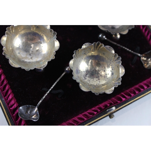 2455 - A cased set of four .925 sterling silver salt dishes with spoons - approx. gross weight 60g