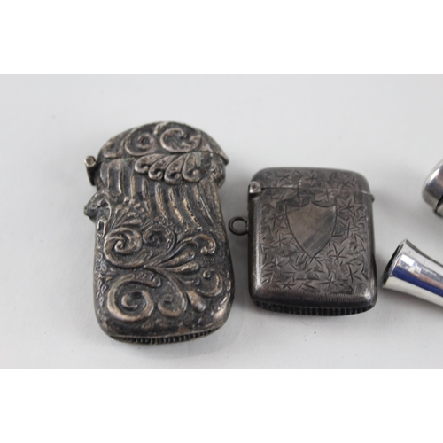 2471 - Four .925 sterling silver tobacciana items to include two vesta cases etc. - approx. gross weight 64... 