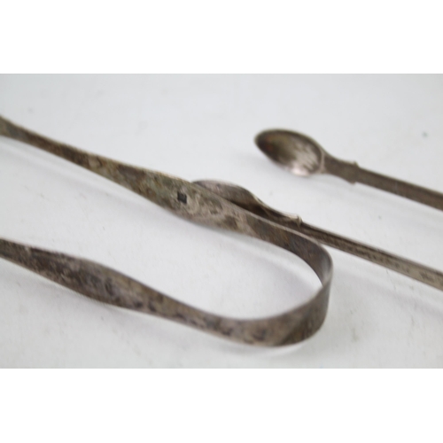 2475 - Two pairs of sterling silver sugar tongs - approx. gross weight 68g