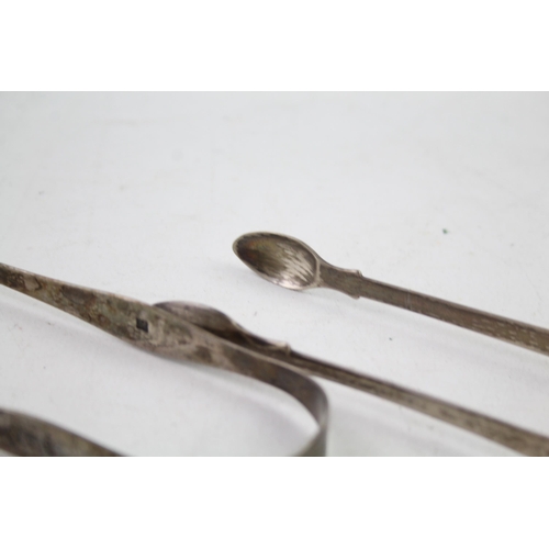 2475 - Two pairs of sterling silver sugar tongs - approx. gross weight 68g