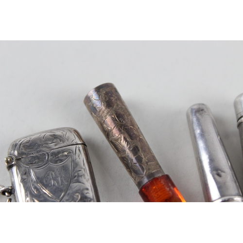 2476 - Four pieces of .925 silver tobacciana to include vesta case, two cheroot cases etc. - approx. gross ... 