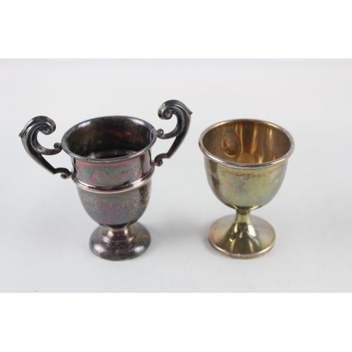 2487 - Two .925 sterling silver items, one trophy and one egg cup - approx. gross weight 54g