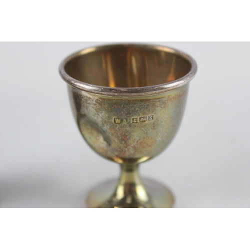 2487 - Two .925 sterling silver items, one trophy and one egg cup - approx. gross weight 54g