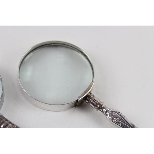 2491 - Two .925 sterling silver handled magnifying glasses - approx. gross weight 108g