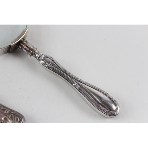 2491 - Two .925 sterling silver handled magnifying glasses - approx. gross weight 108g