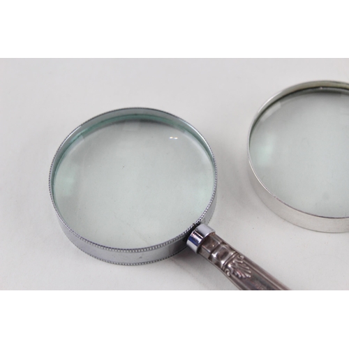 2491 - Two .925 sterling silver handled magnifying glasses - approx. gross weight 108g