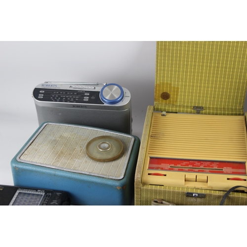 391 - A collection of radios to include early 1970s Grundig Elite-Boy 210E four-band, 1980s Sony ICF-7600D... 