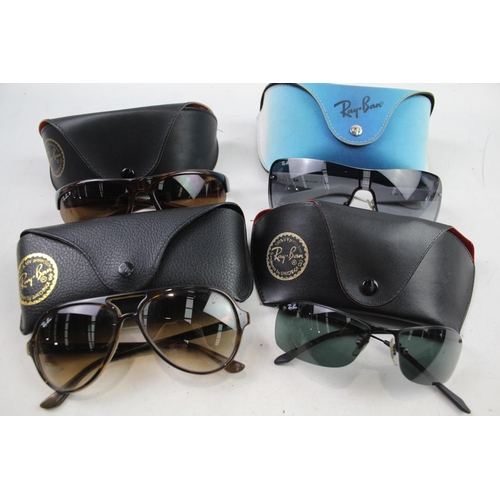 943 - Four cased pairs of Ray-Ban sunglasses