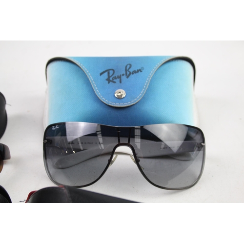 943 - Four cased pairs of Ray-Ban sunglasses