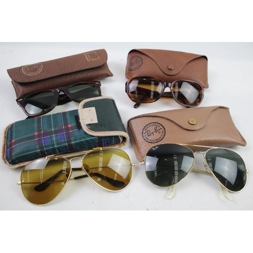 944 - Four cased pairs of Ray-Ban sunglasses