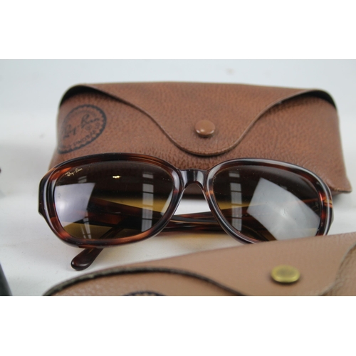 944 - Four cased pairs of Ray-Ban sunglasses