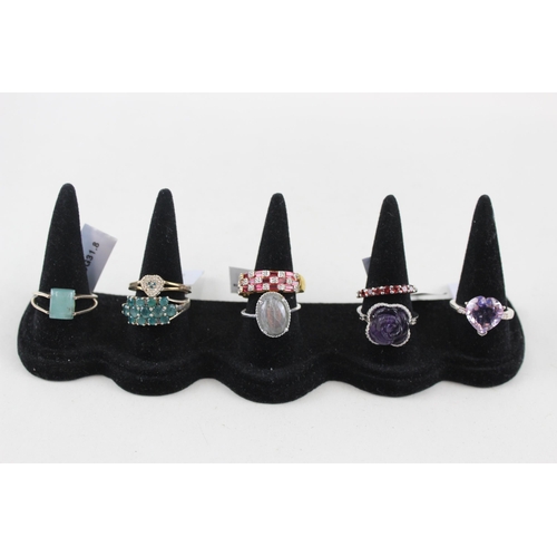 2338 - Eight silver gemstone set rings - approx. gross weight 31g