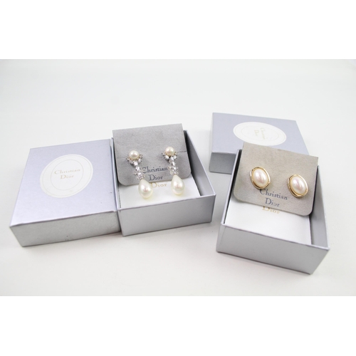 2346 - Two pairs of boxed Christian Dior earrings - approx. gross weight 25g