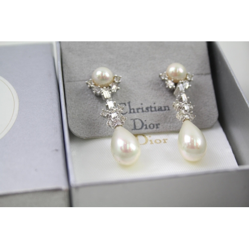 2346 - Two pairs of boxed Christian Dior earrings - approx. gross weight 25g