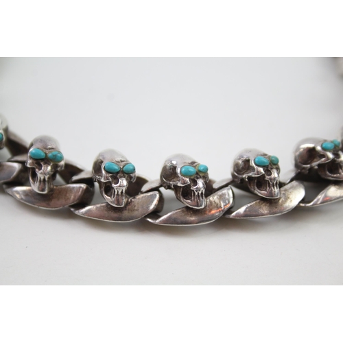 2353 - A silver skull design curb link bracelet - approx. gross weight 135g