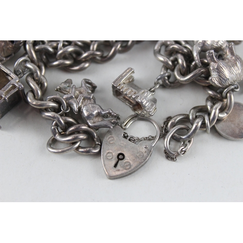 2389 - A silver charm bracelet with assorted animal charms - approx. gross weight 81g