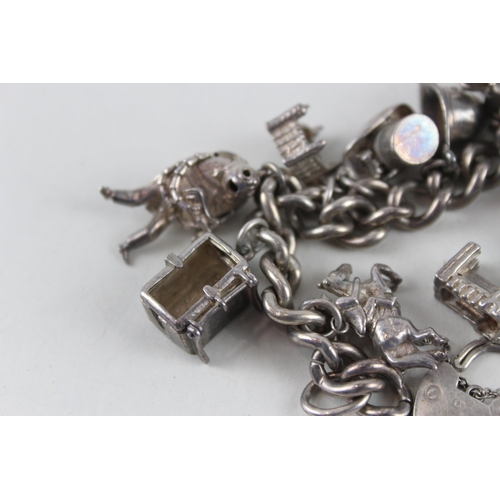 2389 - A silver charm bracelet with assorted animal charms - approx. gross weight 81g