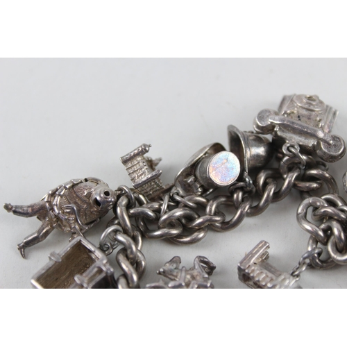 2389 - A silver charm bracelet with assorted animal charms - approx. gross weight 81g