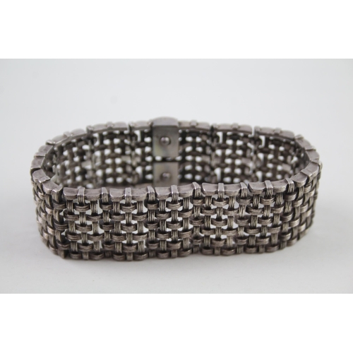 2416 - A silver woven design bracelet - approx. gross weight 57g