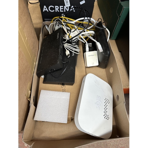 468 - A box containing various landline phones and WIFI routers