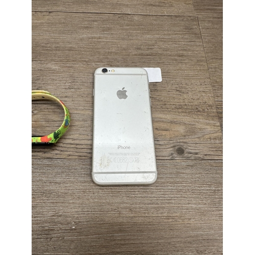 473 - An Apple iPhone 6 A156 with fitness tracker