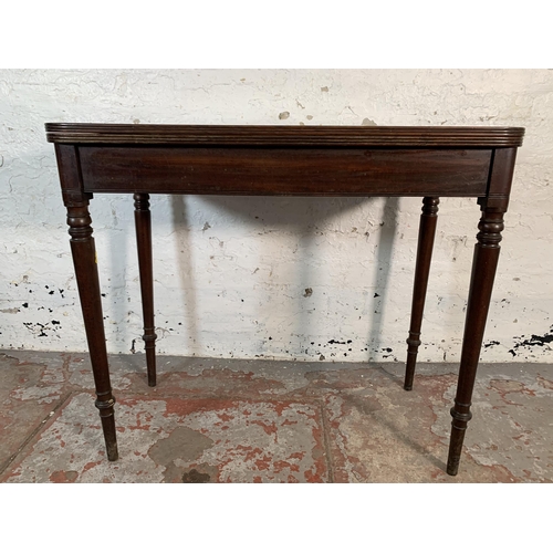 102 - A 19th century H. Y. Walker of Lancaster mahogany fold over tea table - approx. 74cm high x 86cm wid... 