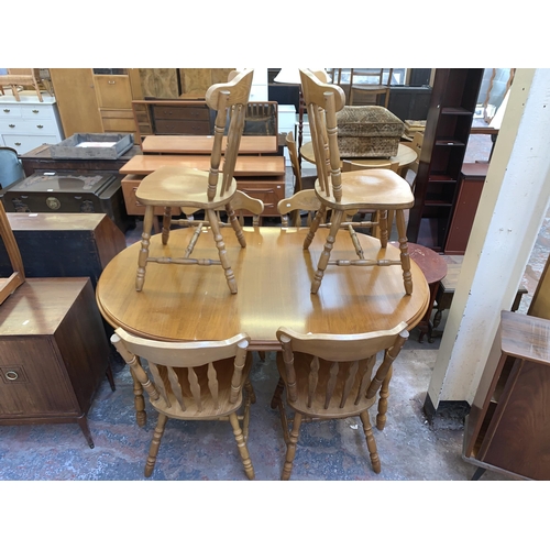 109 - A beech extending dining table and six chairs - approx. 76cm high x 110cm wide x 165cm long