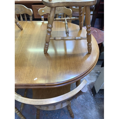 109 - A beech extending dining table and six chairs - approx. 76cm high x 110cm wide x 165cm long