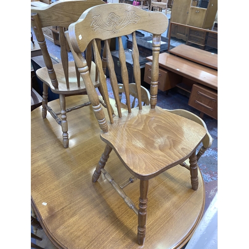 109 - A beech extending dining table and six chairs - approx. 76cm high x 110cm wide x 165cm long