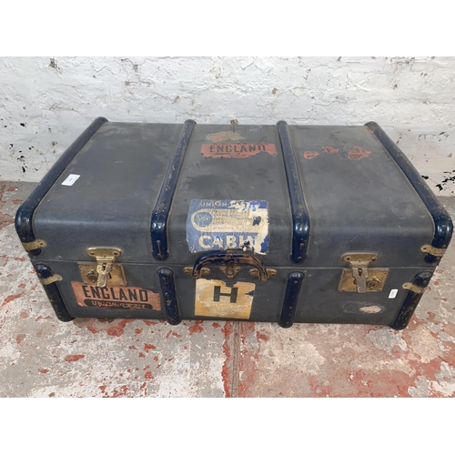 224 - A mid 20th century blue fibreboard travel trunk - approx.  32cm high x 76cm wide x 48cm deep