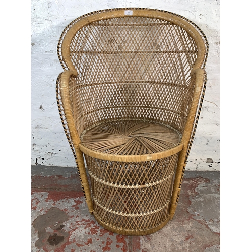 226 - A mid 20th century wicker peacock chair - approx. 94cm high x 65cm wide x 47cm deep