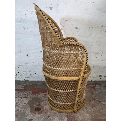 226 - A mid 20th century wicker peacock chair - approx. 94cm high x 65cm wide x 47cm deep