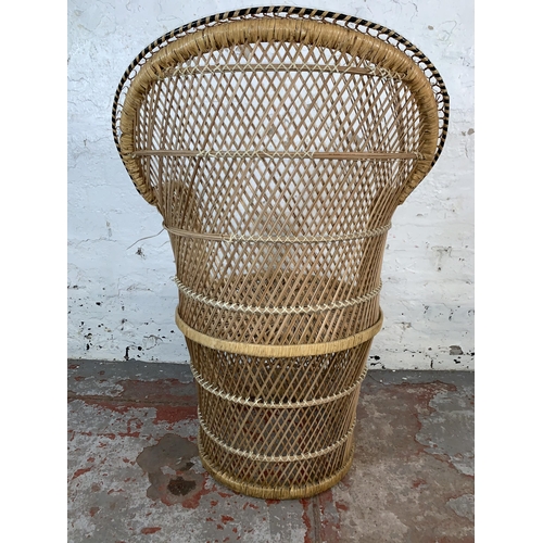 226 - A mid 20th century wicker peacock chair - approx. 94cm high x 65cm wide x 47cm deep