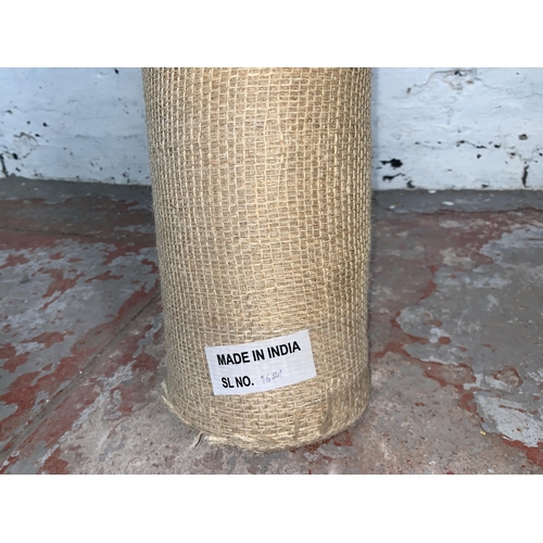 235 - A roll of hessian fabric