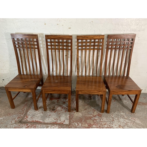 248 - Four Indian sheesham wood dining chairs