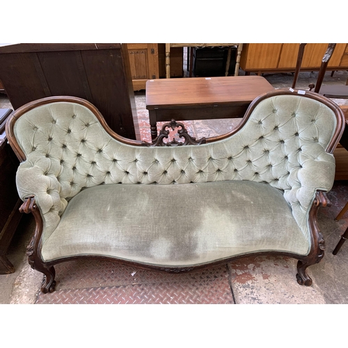 77 - A Victorian carved rosewood and green fabric upholstered double spoon back parlour sofa - approx. 80... 