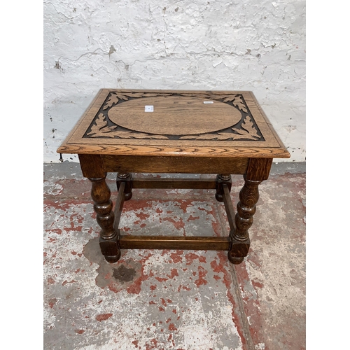 78 - An early 20th century carved oak side table - approx. 40cm high x 35cm wide x 46cm long