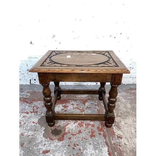 78 - An early 20th century carved oak side table - approx. 40cm high x 35cm wide x 46cm long