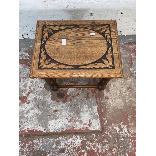 78 - An early 20th century carved oak side table - approx. 40cm high x 35cm wide x 46cm long