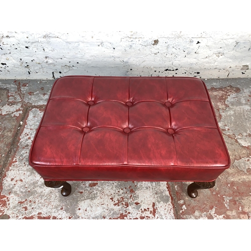 79 - A mid 20th century Sherborne red vinyl upholstered footstool on cabriole supports - approx. 32cm hig... 