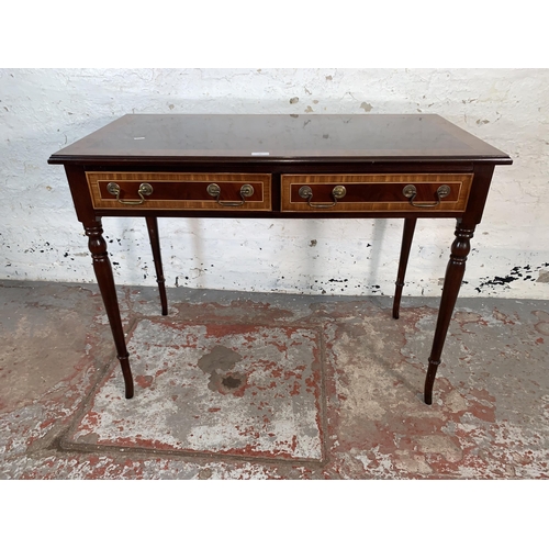 80 - A 19th century style inlaid mahogany writing table with two drawers - approx. 76cm high x 99cm wide ... 